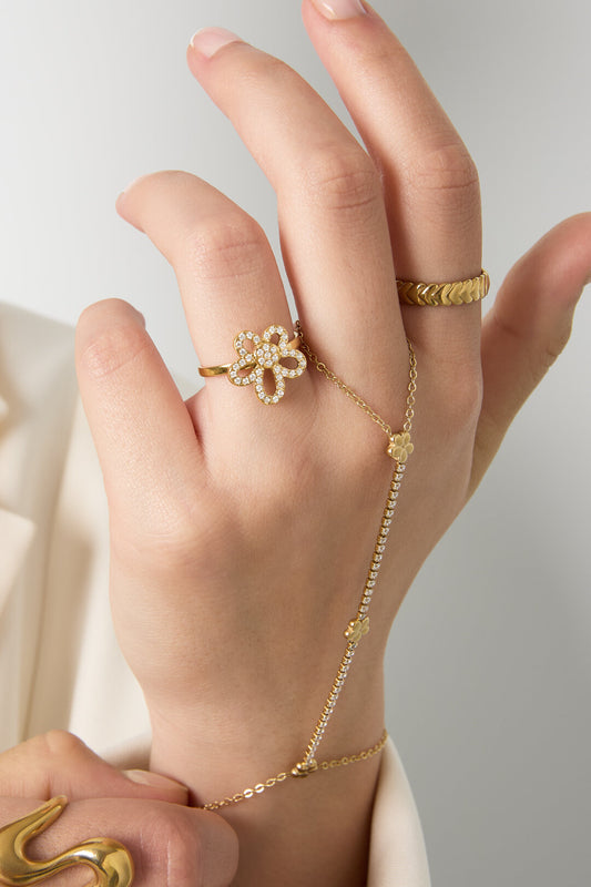 Ring with inlaid flower