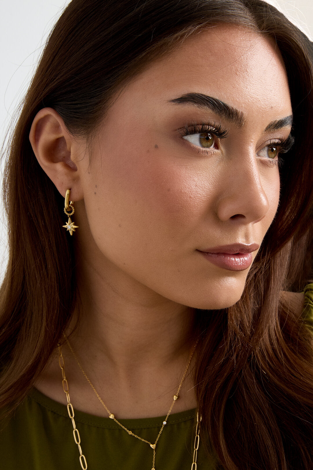 Earrings with shooting star on small hoop